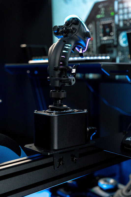 Flight sim joystick with colorful lighting in a dark room with computer screens in the background