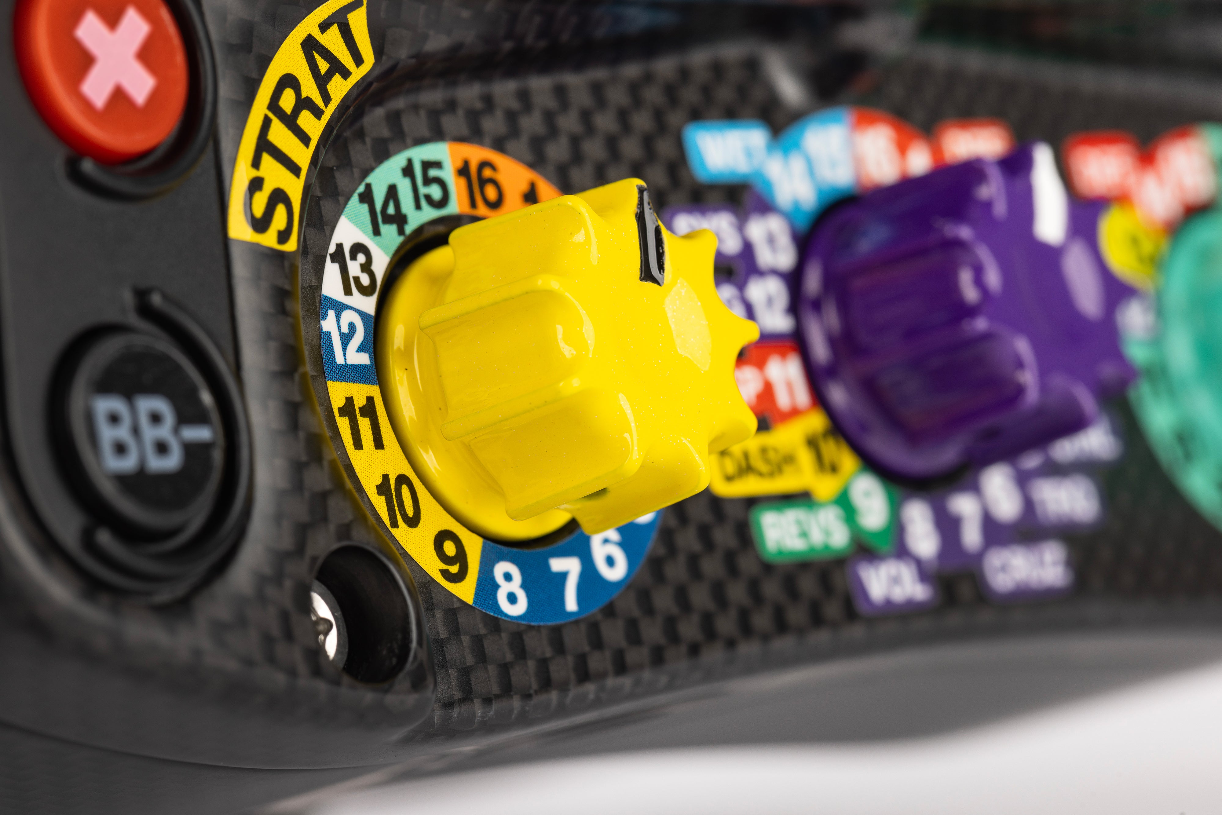 Yellow rotary switch at the bottom of the Mercedes-AMG PETRONAS Formula One Team Sim Racing Steering Wheel (2024)