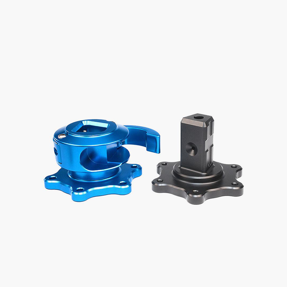 XERO-PLAY™ Quick Release with black motor-side base and blue 70mm wheel-side adapter.