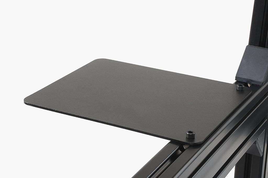 Mousepad mounted on the sim racing cockpit. 