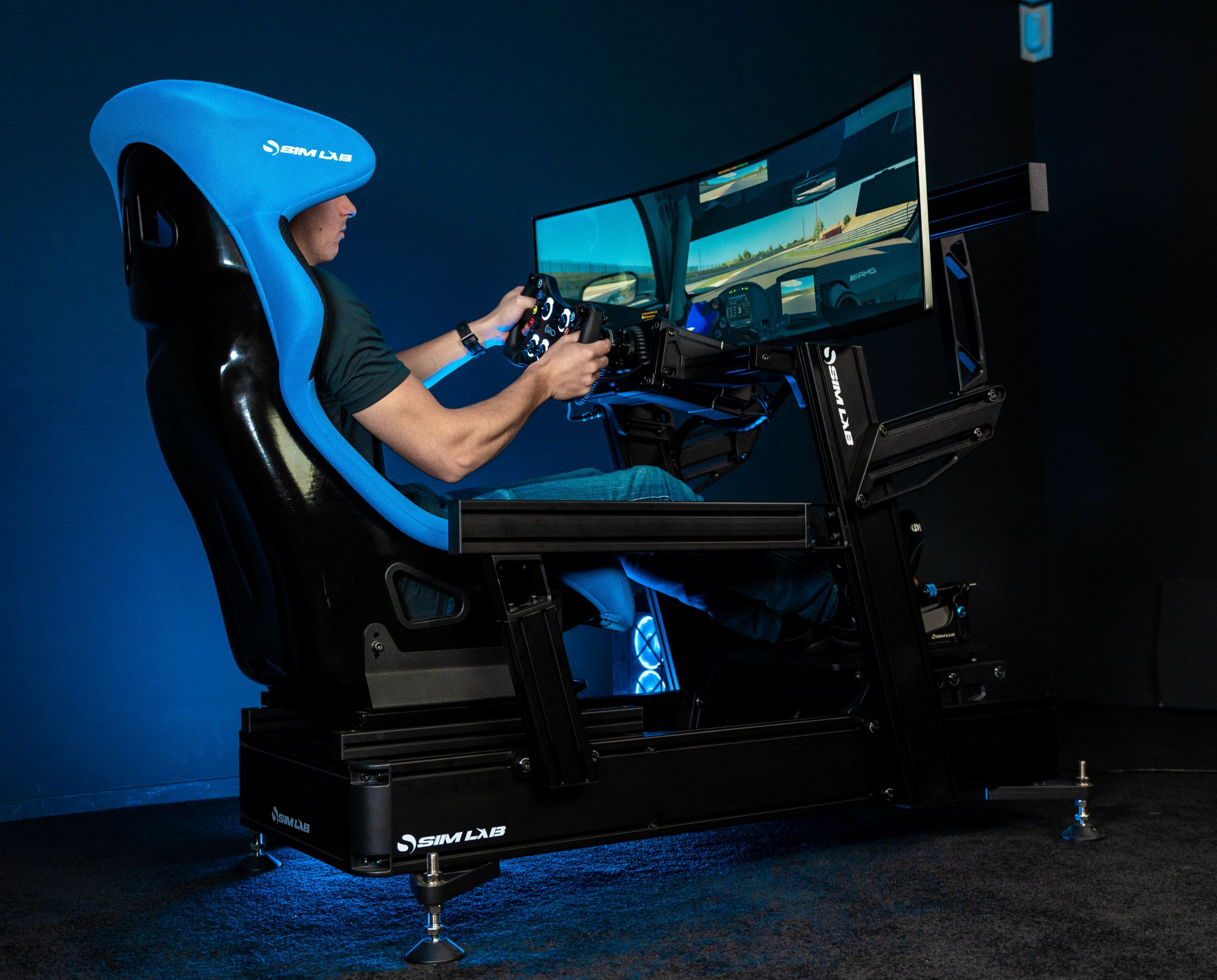 P1X Pro cockpit with the Integrated Vario monitor mount and blue Speed seat. 