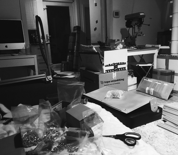 Early days of Sim-Lab: founder using his living room as a packing station for shipping initial product orders.