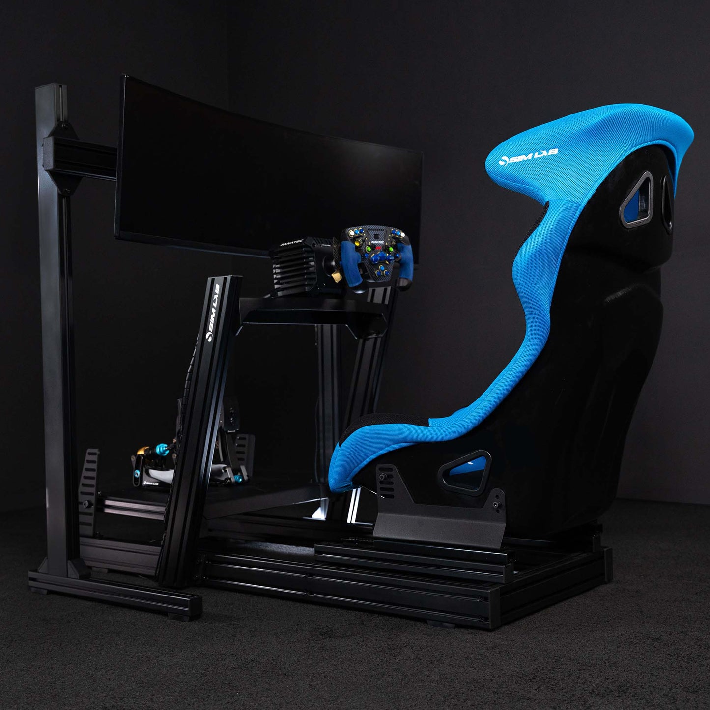 GT1 PRO Sim Racing Cockpit Full Setup with Speed1 Blue Seat and Monitor Stand, the picture shows installed Wheel, XP-1 Pedals, and Monitor