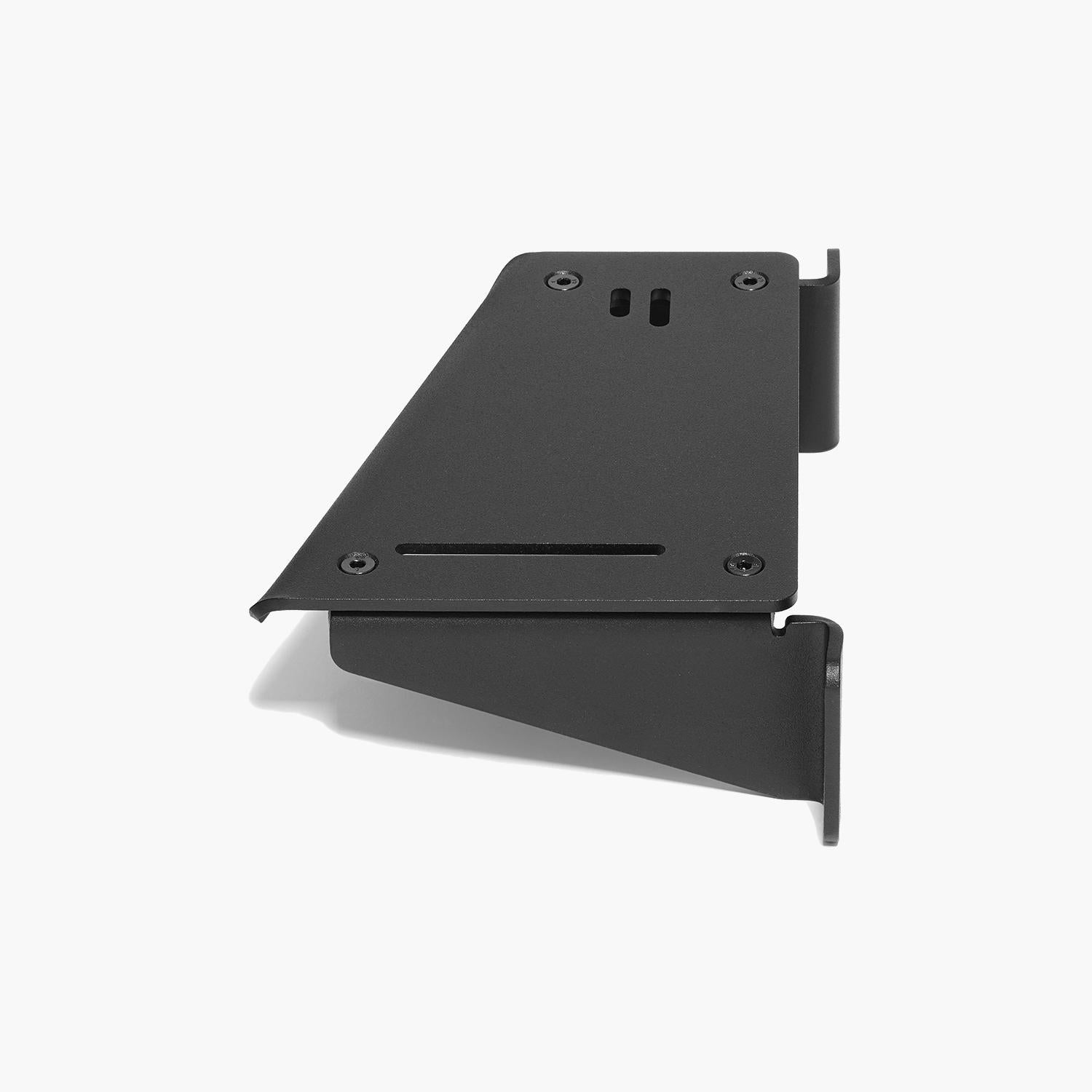 Angled mounting bracket for XB1 handbrake.